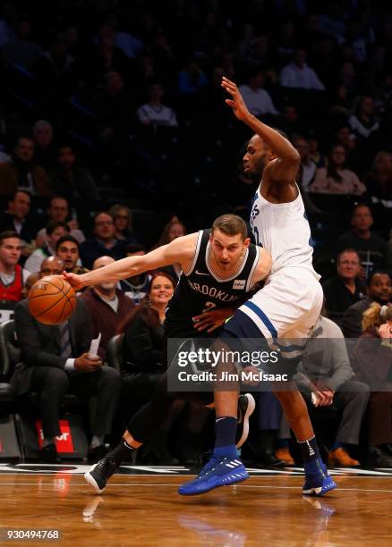 Nik Stauskas of the Brooklyn Nets in action against Andrew Wiggins of the Minnesota Timberwolves at Barclays Center on January 3, 2018 in the...