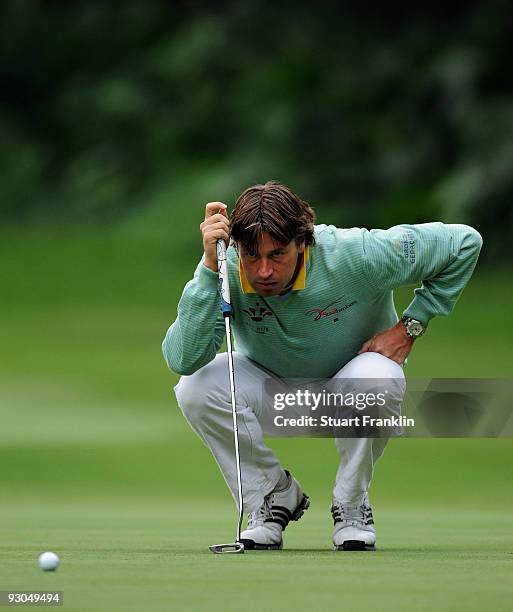 Robert-Jan Derksen of The Netherlands lines up his putt on the 16th hole during the third round of the UBS Hong Kong Open at the Hong Kong Golf Club...