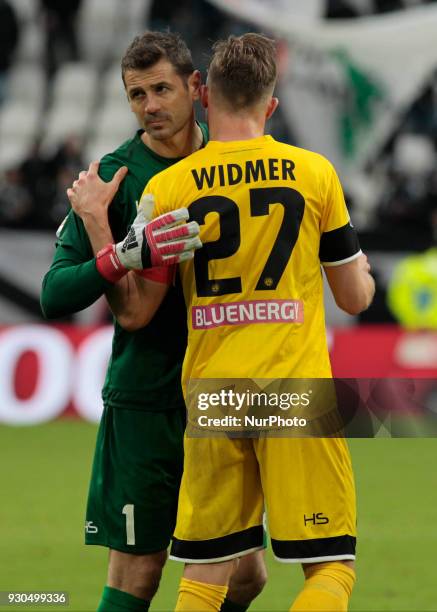 Albano Bizzarri and Silvan Widmer of Udinese Calcio during the serie A match between Juventus and Udinese Calcio on March 11, 2018 in Turin, Italy. .