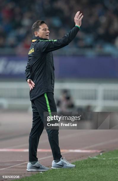 Head coach of Beijing Guoan Roger Schmidt in action during the 2018 Chinese Super League match between Jiangsu Suning and Beijing Guoan at Nanjing...