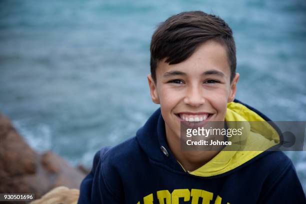 lächelte teenager mit mops hund - i love teen boys stock-fotos und bilder