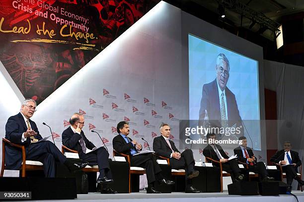 Panelists take part in a discussion during a session of the Asia-Pacific Economic Cooperation CEO Summit 2009, in Singapore, on Saturday, Nov. 14,...