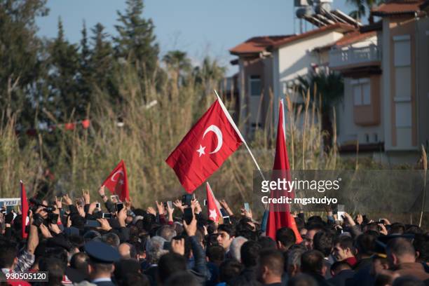 turkish people are walking with turkish flag in formal way - 29 ekim stock pictures, royalty-free photos & images