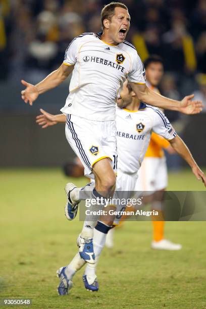 Gregg Berhalter of the Los Angeles Galaxy celebrates his goal against the Houston Dynamo during the first overtime period of the Western Conference...