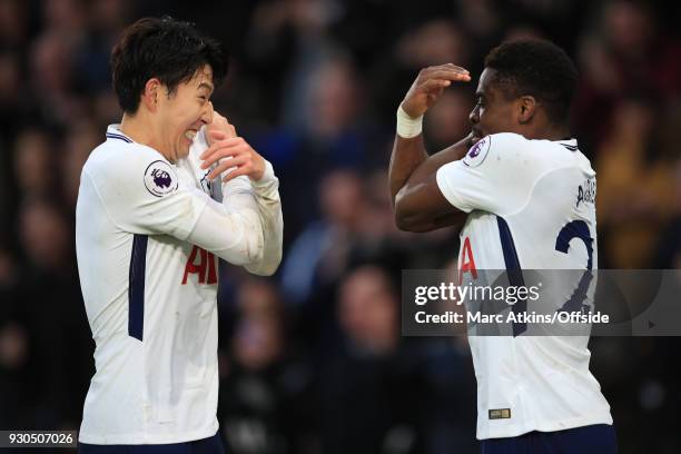 Son Heung-min and Serge Aurier of Tottenham Hotspur celebrate their 4th goal during the Premier League match between AFC Bournemouth and Tottenham...