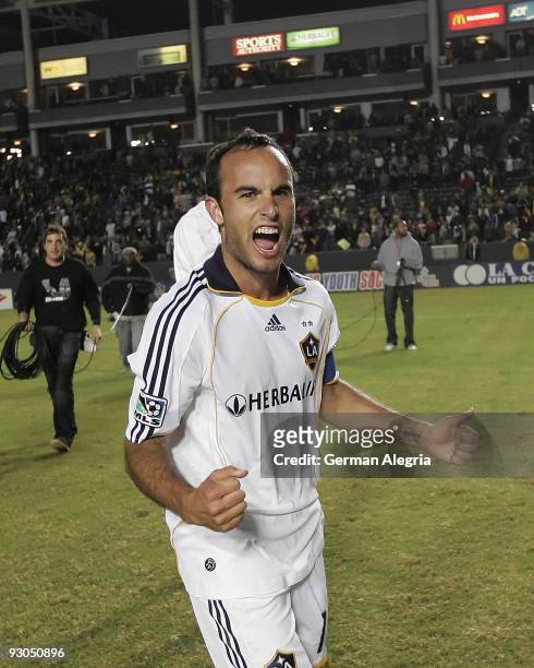 Landon Donovan of the Los Angeles Galaxy celebrates the victory over the Houston Dynamo at the final whistle of the 2009 MLS Western Conference...