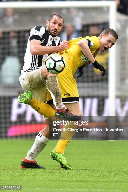 Giorgio Chiellini of Juventus competes for the ball with Jakub Jankto of Udinese Calcio during the serie A match between Juventus and Udinese Calcio...