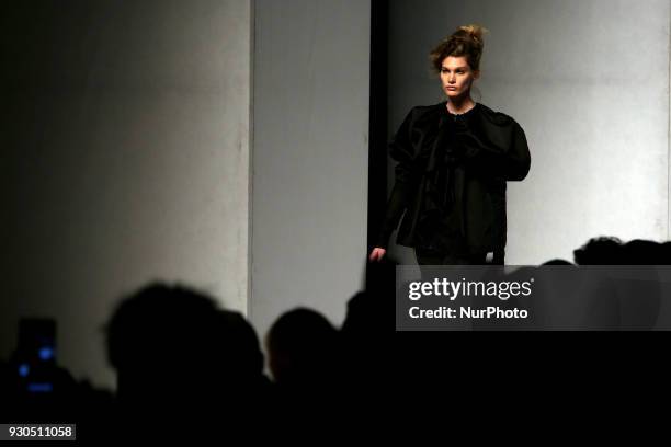 Model presents a creation from the Portuguese fashion designer David Ferreira Fall / Winter 2018 - 2019 collection during the Lisbon Fashion Week -...