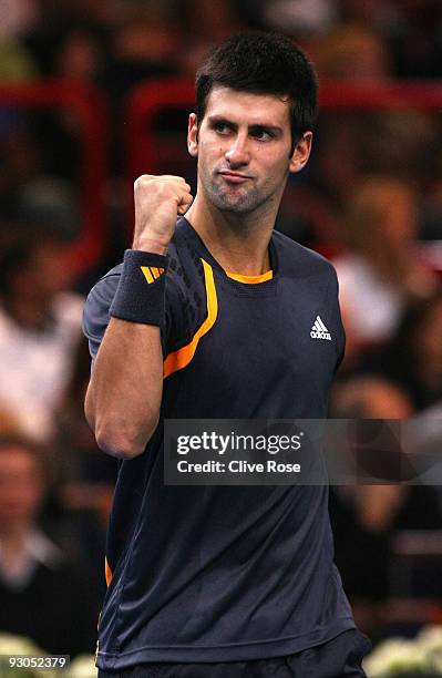 Novak Djokovic of Serbia celebrates during his semi-final match against Rafael Nadal of Spain during the ATP Masters Series at the Palais Omnisports...