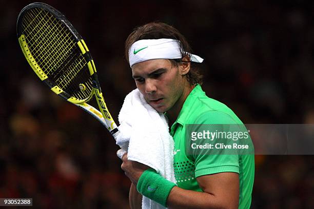 Rafael Nadal of Spain wipes down during his semi-final match against Novak Djokovic of Serbia during the ATP Masters Series at the Palais Omnisports...