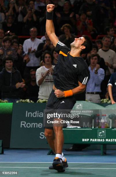 Novak Djokovic of Serbia celebrates winning his semi-final match against Rafael Nadal of Spain during the ATP Masters Series at the Palais Omnisports...