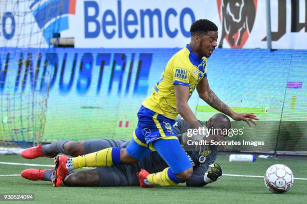 Chuba Akpom of Sint Truiden, Kenneth Vermeer of Club Brugge during the Belgium Pro League match between Sint Truiden v Club Brugge at the Stayen on...