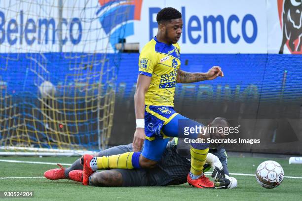Chuba Akpom of Sint Truiden, Kenneth Vermeer of Club Brugge during the Belgium Pro League match between Sint Truiden v Club Brugge at the Stayen on...