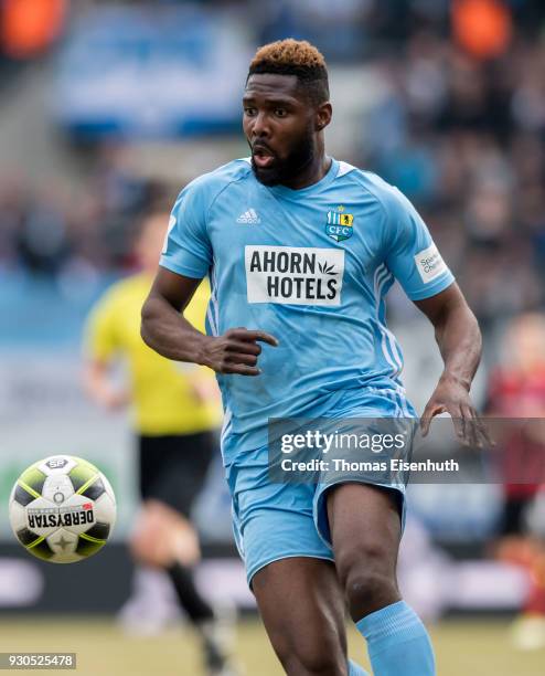 Emmanuel Mbende of Chemnitz plays the ball during the 3. Liga match between Chemnitzer FC and Hallescher FC at community4you ARENA on March 11, 2018...