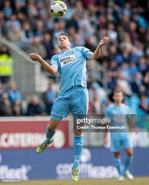 Daniel Frahn of Chemnitz plays the ball during the 3. Liga match between Chemnitzer FC and Hallescher FC at community4you ARENA on March 11, 2018 in...