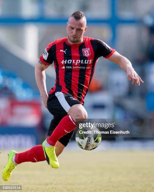 Toni Lindenhahn of Halle plays the ball during the 3. Liga match between Chemnitzer FC and Hallescher FC at community4you ARENA on March 11, 2018 in...