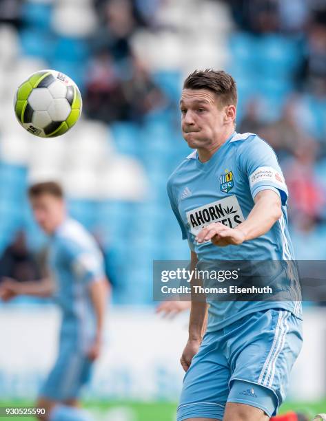 Daniel Frahn of Chemnitz plays the ball during the 3. Liga match between Chemnitzer FC and Hallescher FC at community4you ARENA on March 11, 2018 in...