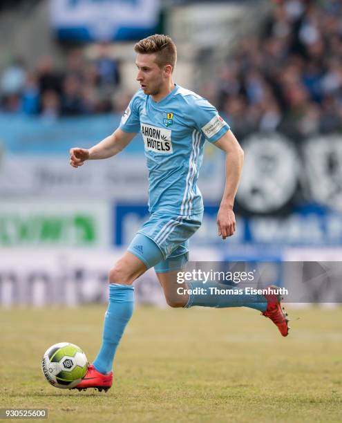Marcus Mlynikowski of Chemnitz plays the ball during the 3. Liga match between Chemnitzer FC and Hallescher FC at community4you ARENA on March 11,...