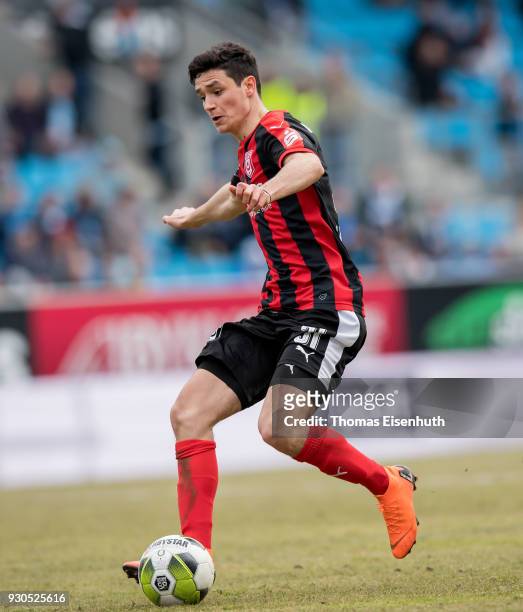 Niklas Landgraf of Halle plays the ball during the 3. Liga match between Chemnitzer FC and Hallescher FC at community4you ARENA on March 11, 2018 in...