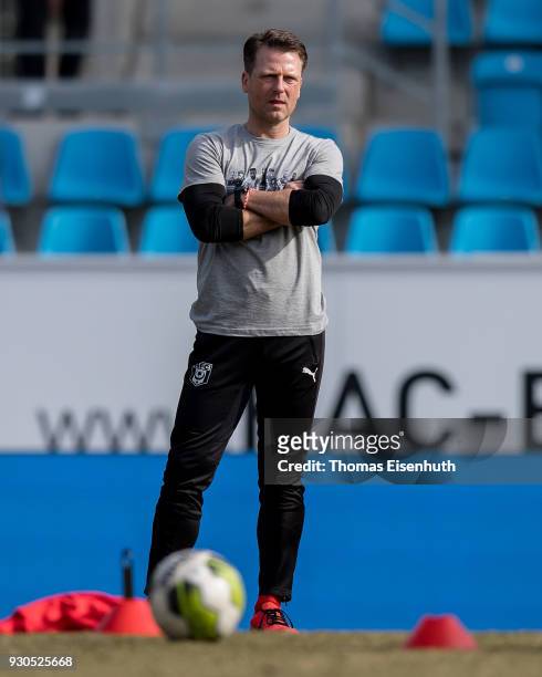 Coach Rico Schmitt of Halle reacts prior the 3. Liga match between Chemnitzer FC and Hallescher FC at community4you ARENA on March 11, 2018 in...