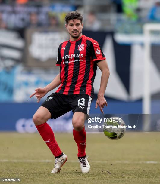 Stefan Kleineheismann of Halle plays the ball during the 3. Liga match between Chemnitzer FC and Hallescher FC at community4you ARENA on March 11,...