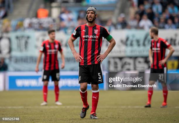 Klaus Gjasula of Halle reacts during the 3. Liga match between Chemnitzer FC and Hallescher FC at community4you ARENA on March 11, 2018 in Chemnitz,...