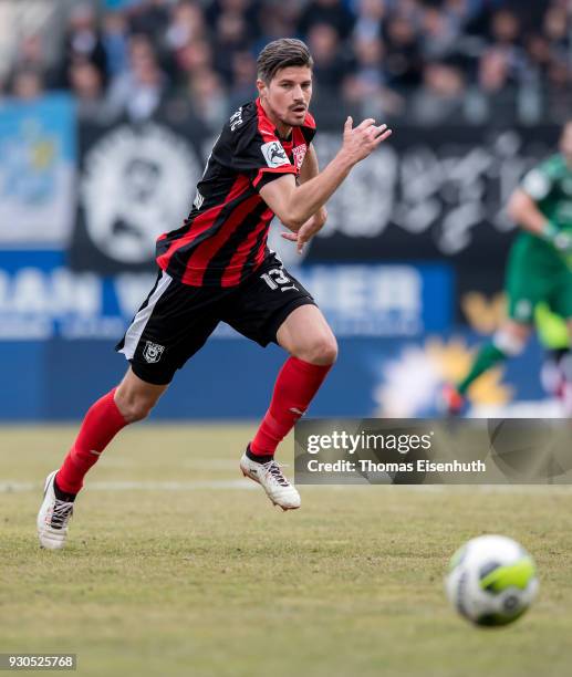 Stefan Kleineheismann of Halle plays the ball during the 3. Liga match between Chemnitzer FC and Hallescher FC at community4you ARENA on March 11,...