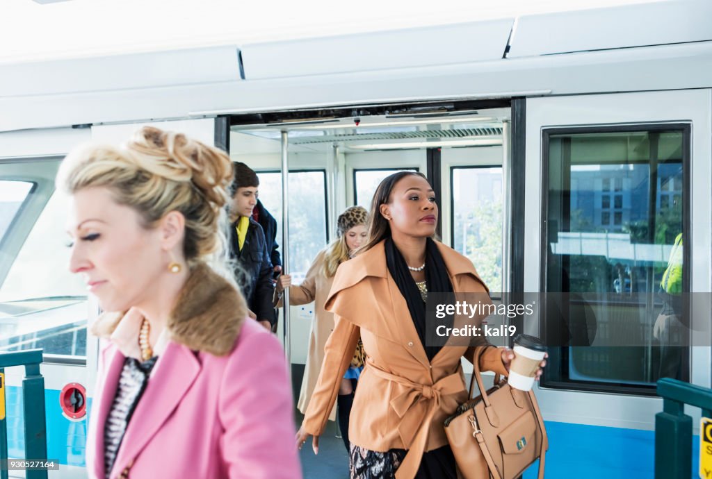 Passengers exiting train