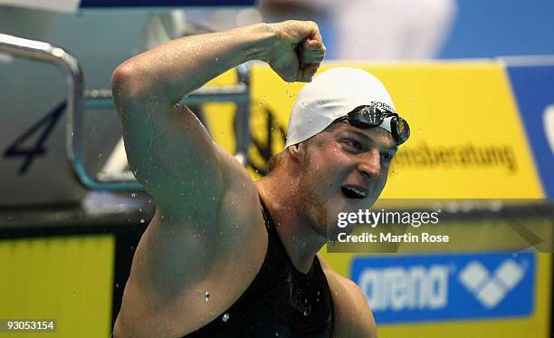 Steffen Deibler of Germany celebrates after winning the men's 50m butterfly during day one of the FINA/ARENA Swimming World Cup on November 14, 2009...