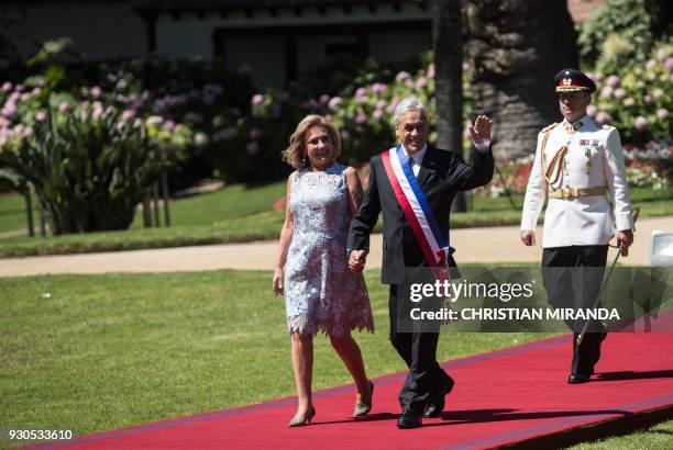 Chile's newly inaugurated President Sebastian Pinera and his wife Cecilia Morel arrive at the official country retreat and summer residence Cerro...