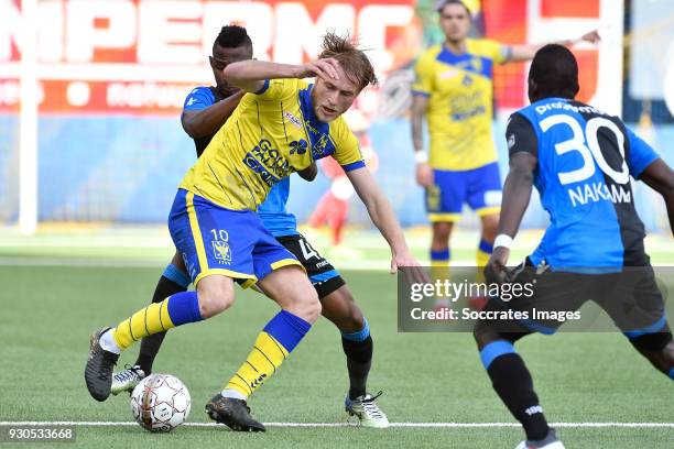 Roman Bezus of Sint Truiden, Dennis Bonaventure of Club Brugge during the Belgium Pro League match between Sint Truiden v Club Brugge at the Stayen...