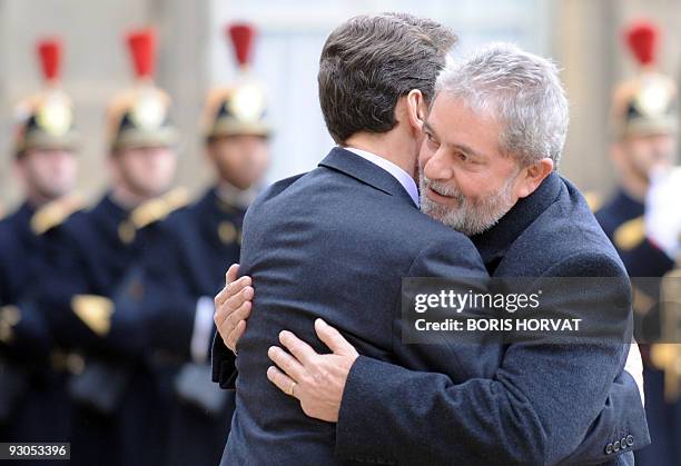 French President Nicolas Sarkozy welcomes his Brazilian counterpart Luiz Inacio Lula da Silva prior to a meeting on November 14, 2009 at the Elysee...