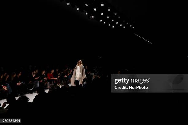 Model presents a Fall/Winter 2018-2019 collection creation by Portuguese fashion Filipe Faisca during the 50th edition of Moda Lisboa Fashion Week at...