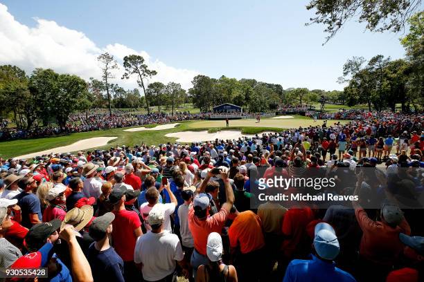 Tiger Woods putts on the fourth green during the final round of the Valspar Championship at Innisbrook Resort Copperhead Course on March 11, 2018 in...