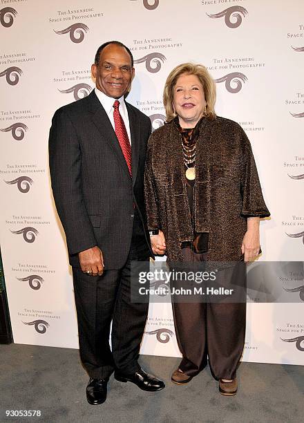 Former NFL Player/USC Athletic Director Mike Garrett and Wallis Annenberg attend the opening of SPORT: Iooss & Leifer at the Annenberg Space For...