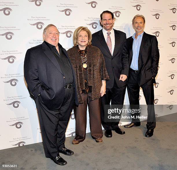 Sports Photographer Neil Leifer, Wallis Annenberg, Charlie Annenberg and Sports Photographer Walter Iooss Jr. Attend the opening of SPORT: Iooss &...