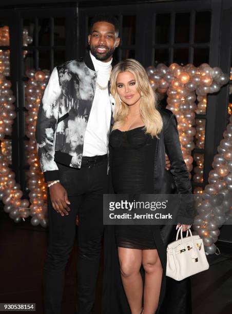 Tristan Thompson and Khloe Kardashian pose for a photo as Remy Martin celebrates Tristan Thompson's Birthday at Beauty & Essex on March 10, 2018 in...