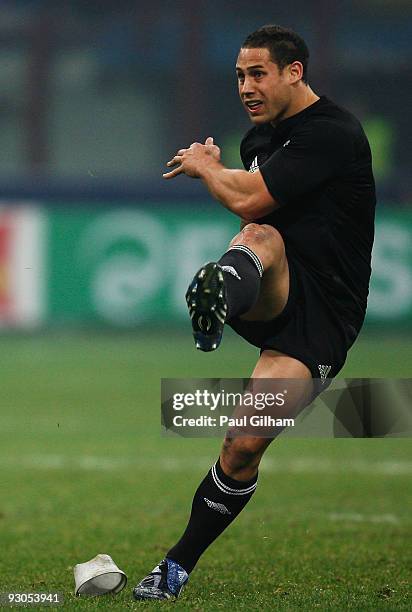 Luke McAlister of New Zealand kicks a penalty during the international rugby match between Italy and New Zealand at the San Siro Stadium on November...
