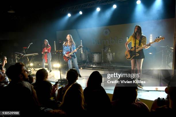 Alana Haim, Danielle Haim and Este Haim of HAIM perform onstage during Bumble Presents: Empowering Connections at Fair Market on March 10, 2018 in...