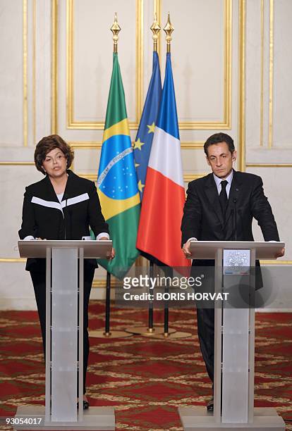 French President Nicolas Sarkozy gives a press conference flanked by Brazilian minister Dilma Roussef prior to a meeting with his Brazilian...