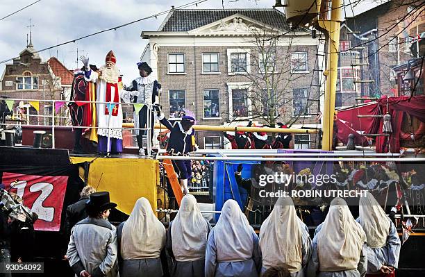 Sinterklaas and his Peters arrive with their ship in Schiedam on November 14, 2009. The Sinterklaas feast celebrates the name day, December 6, of...