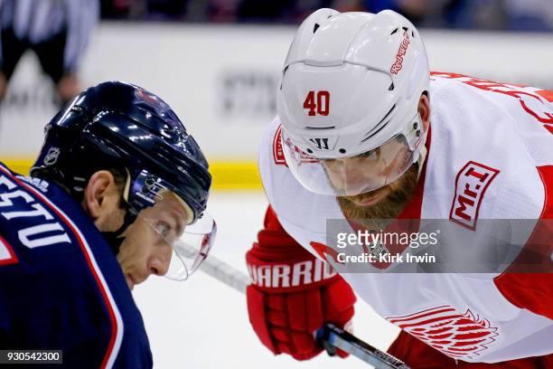 Henrik Zetterberg of the Detroit Red Wings and Mark Letestu of the Columbus Blue Jackets line up for a face-off during the game on March 9, 2018 at...