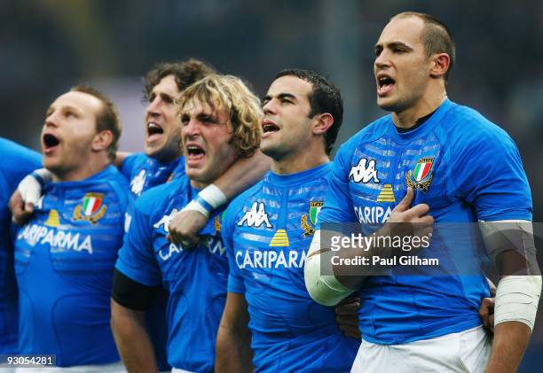 Sergio Parisse of Italy and his team-mates sing the Italian national anthem prior to the start of the international rugby match between Italy and New...