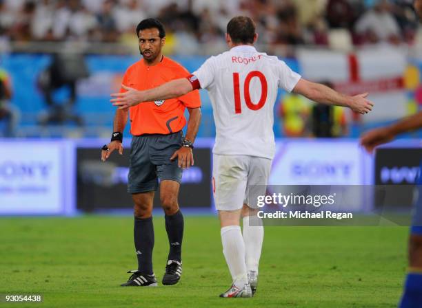 Captain Wayne Rooney of England argues with referee Abduiraham Abdou during the International Friendly match between Brazil and England at the...