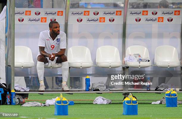 Darren Bent looks on from the bench after being substituted during the International Friendly match between Brazil and England at the Khalifa Stadium...