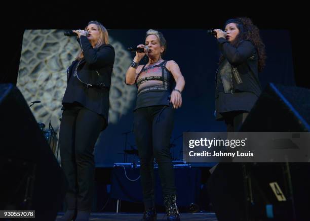 Ann Curless, Gioia Bruno and Jeanette Jurado of Expose perform during the Freestyle concert at Watsco Center on March 10, 2018 in Coral Gables,...