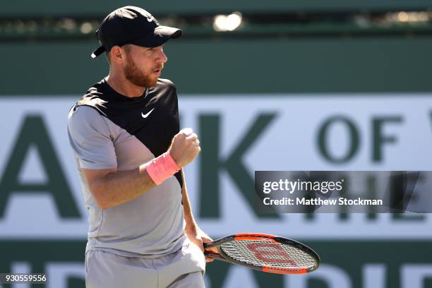 Dudi Sela of Israel celebrates breaking Kyle Edmund of Great Britai during the BNP Paribas Open at the Indian Wells Tennis Garden on March 11, 2018...