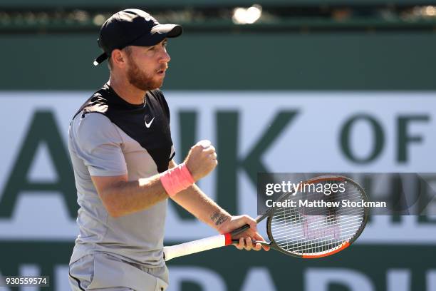 Dudi Sela of Israel celebrates breaking Kyle Edmund of Great Britai during the BNP Paribas Open at the Indian Wells Tennis Garden on March 11, 2018...