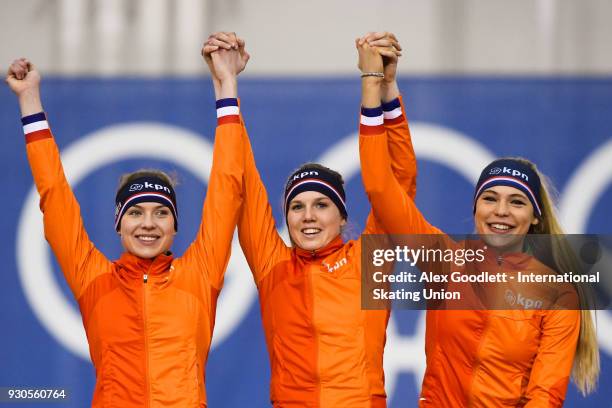 Joy Beune, Jutta Leerdam astand on the podium after winning the ladies team pursuit during the World Junior Speed Skating Championships at the Utah...