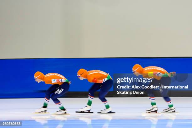 Joy Beune, Jutta Leerdam and Elisa Dul of the Netherlands perform in the ladies team pursuit during the World Junior Speed Skating Championships at...